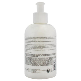 Fresh Rose Morning lotion texture on hand highlighting lightweight absorption benefit