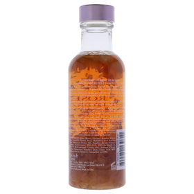 Fresh rose toner close-up of suspended rose petals highlighting natural botanicals and calming effect
