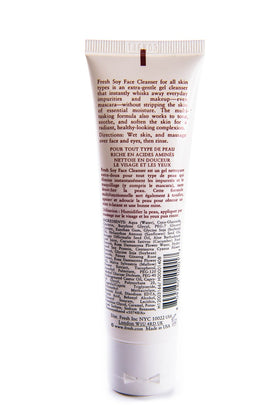 Fresh soy cream-gel texture on fingertip demonstrating gentle, hydrating lather