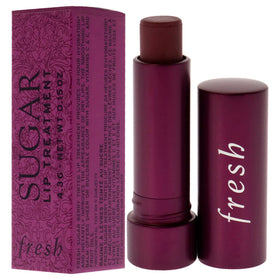 Fresh Sugar Lip Treatment berry applied on lips in daylight showing natural tint benefit