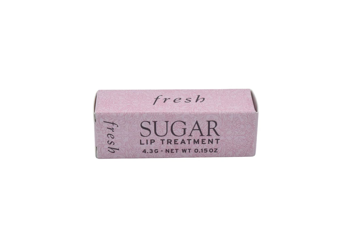 Fresh sugar lip treatment Petal lifestyle smiling model showing natural tinted finish