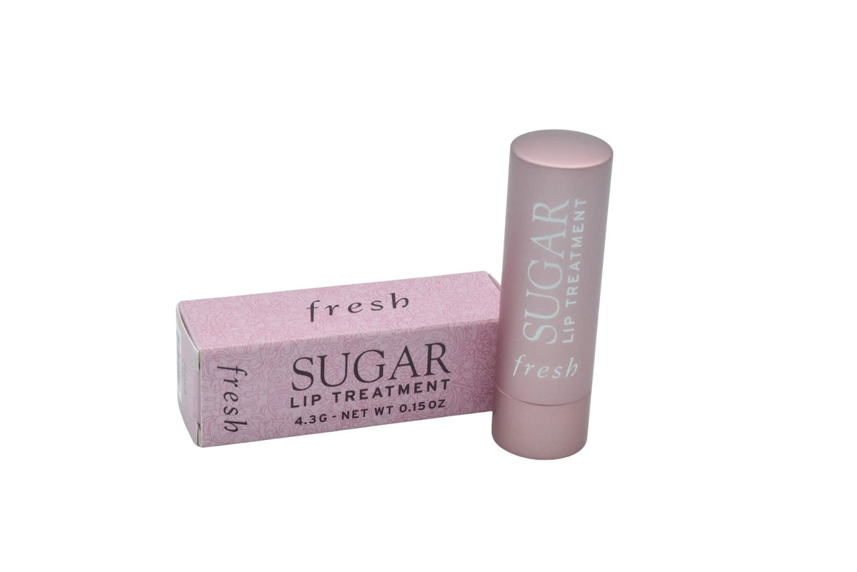 Fresh sugar lip treatment Petal swatch on hand showing buildable pink tint