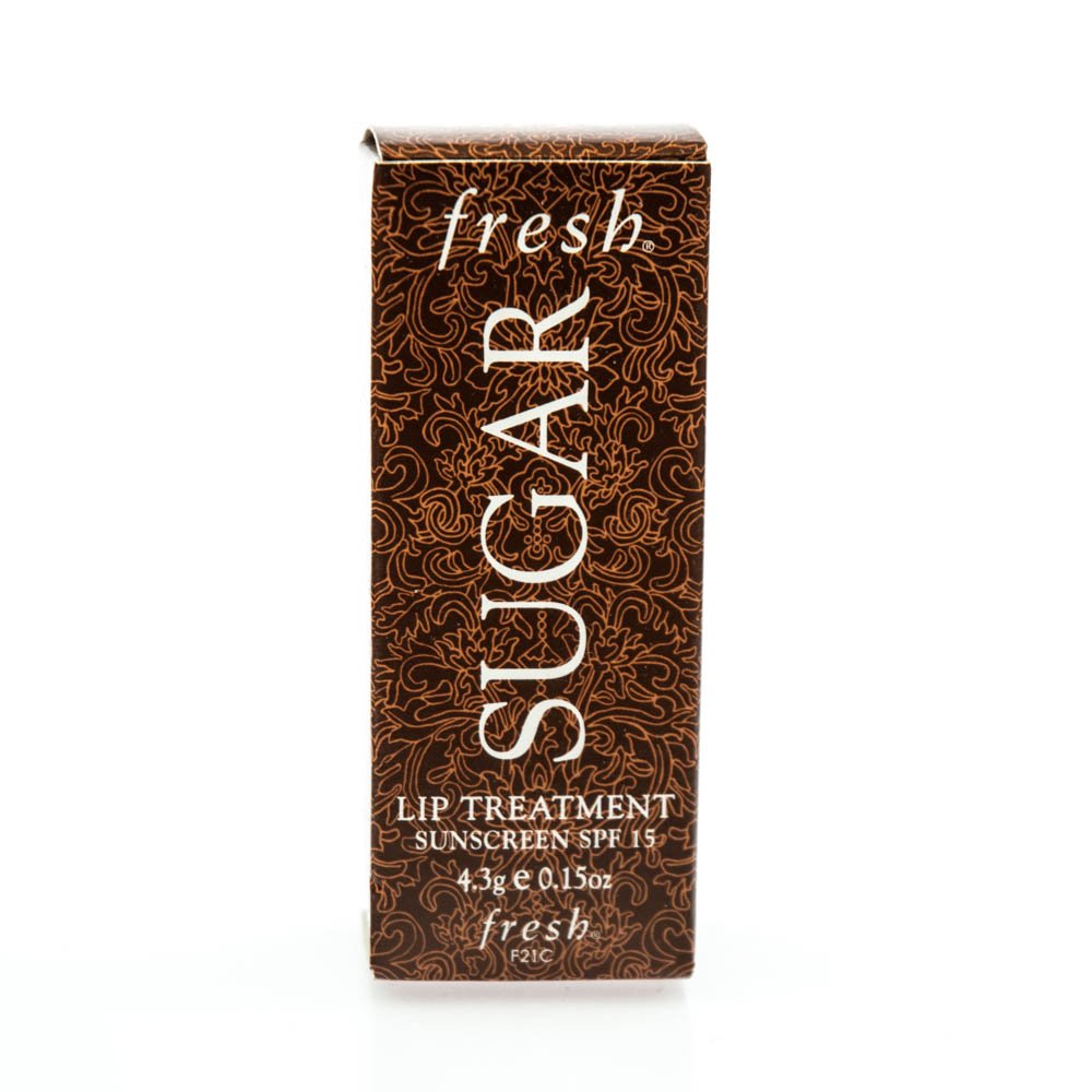 Fresh Sugar lip treatment texture swipe on hand, moisturizing sheen and color