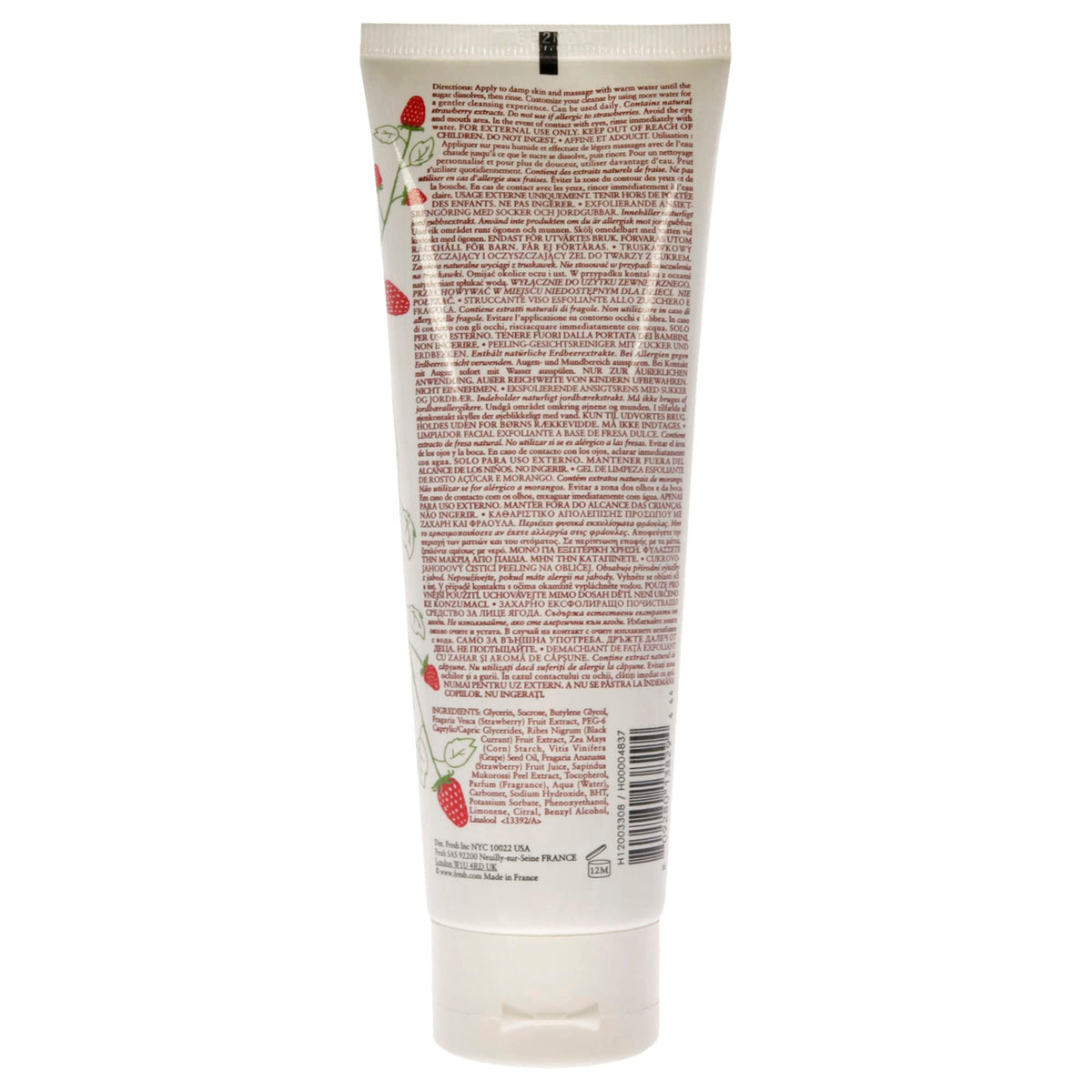 Fresh sugar strawberry size comparison with a hand showing travel-friendly tube