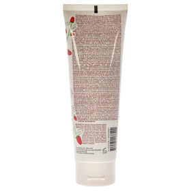 Fresh sugar strawberry size comparison with a hand showing travel-friendly tube