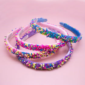 FROG SAC headbands arranged in gift basket showing ready-to-give presentability