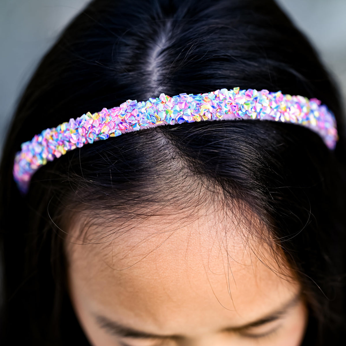 FROG SAC headband paired with party outfit adding playful sparkle