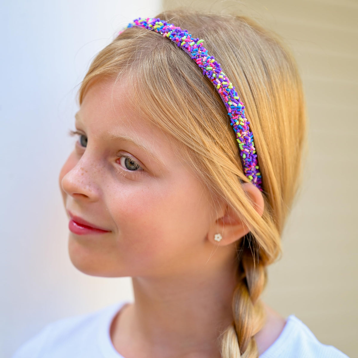 FROG SAC pink headband close-up of sequins highlighting glittery texture benefit