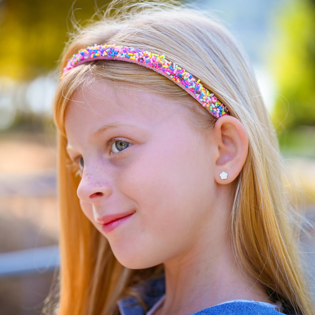 FROG SAC rainbow sprinkle headband group showing playful color coordination