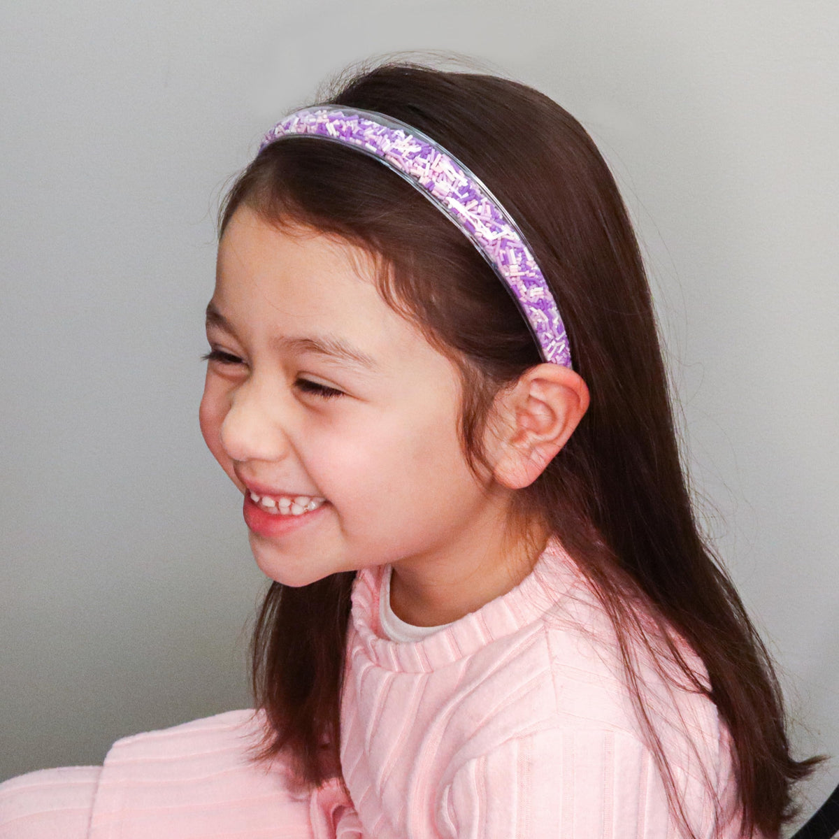 FROG SAC headband beside ruler showing 14 inch size fit