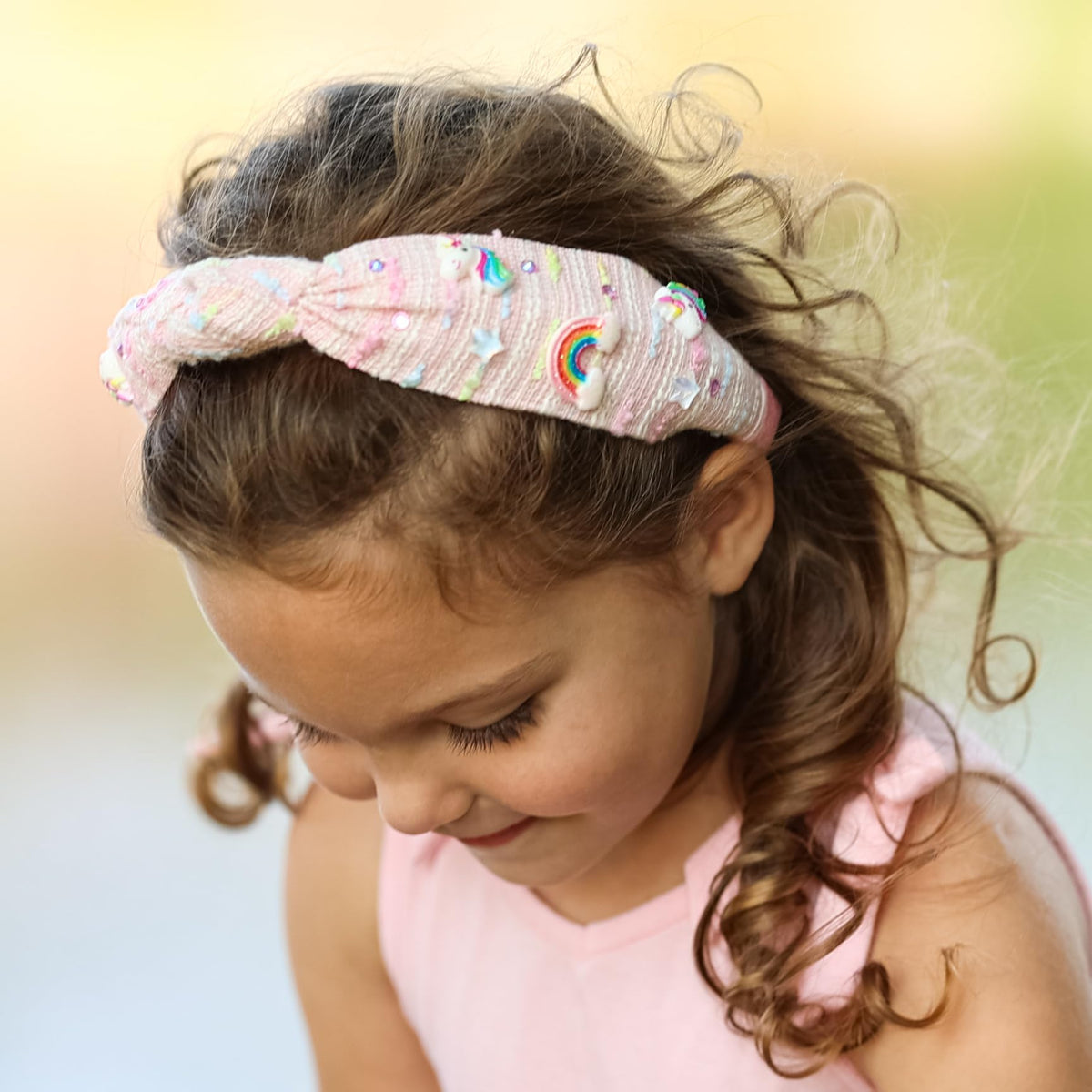 FROG SAC side view worn by child showing secure fit and comfortable hold benefit