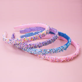 FROG SAC headband in hand showing flexible 13-inch hoop scale benefit