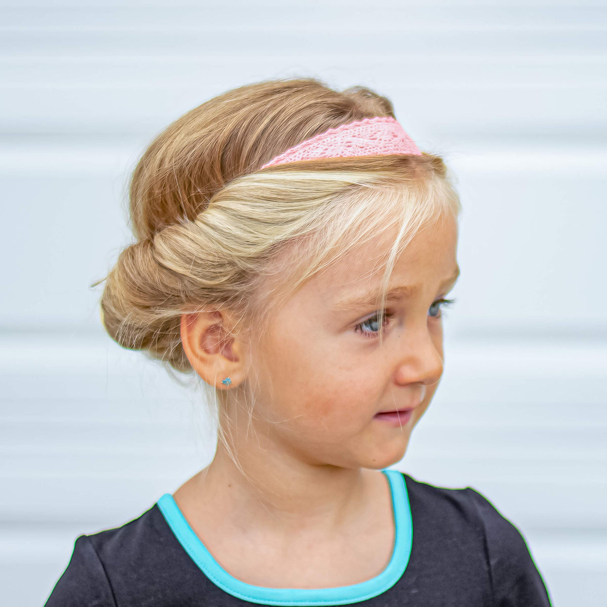 FROG SAC flower girl wearing lace headband as wedding-appropriate accessory