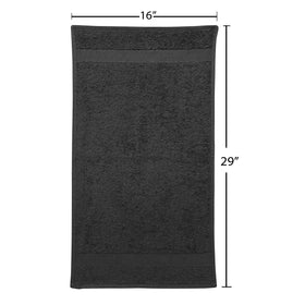 Fromm towel held by hand for size comparison showing the 16x29 dimensions