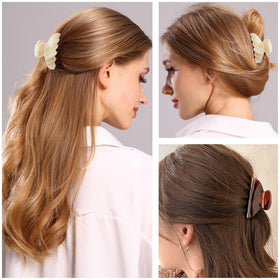 Fsmiling clip securing half-up hairstyle for quick, polished styling