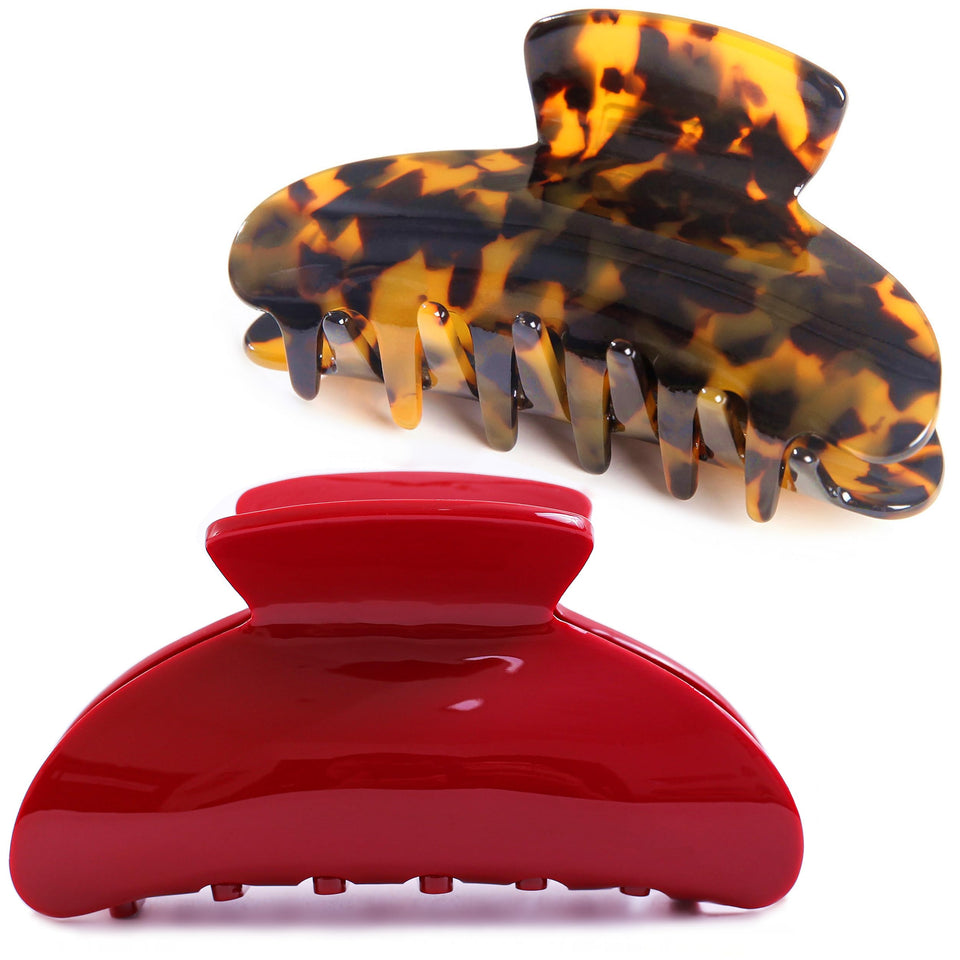 Fsmiling front packaging showing two large tortoise and red clips, stylish storage benefit