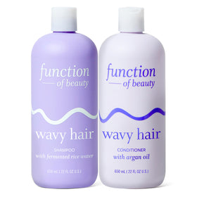 Function of Beauty front packaging showing 22 oz wavy shampoo and conditioner, highlights long-lasting value