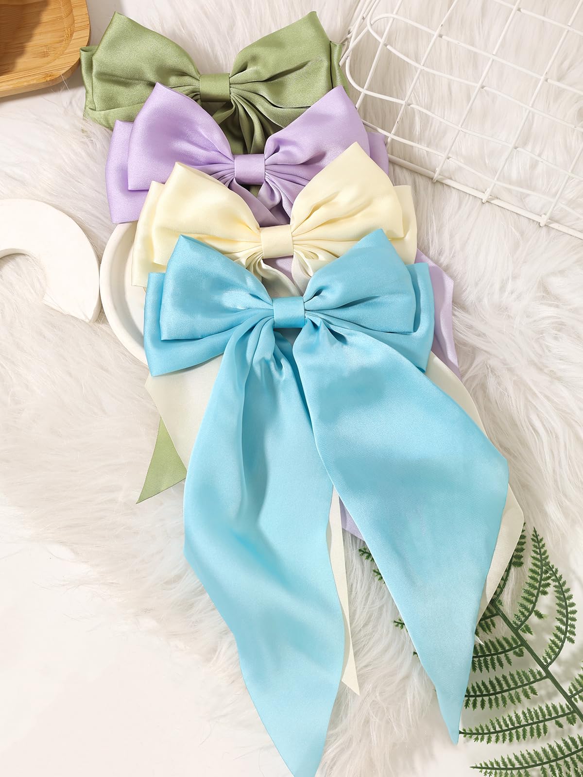 Furling Pompoms held in hand to show actual size and proportion for confident purchase decisions