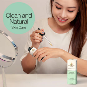 Gaia Body Care oil being applied to cheek showing daily routine ease