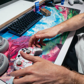 Gamer Grip in gym setting on dumbbells showing versatile grip help for workouts