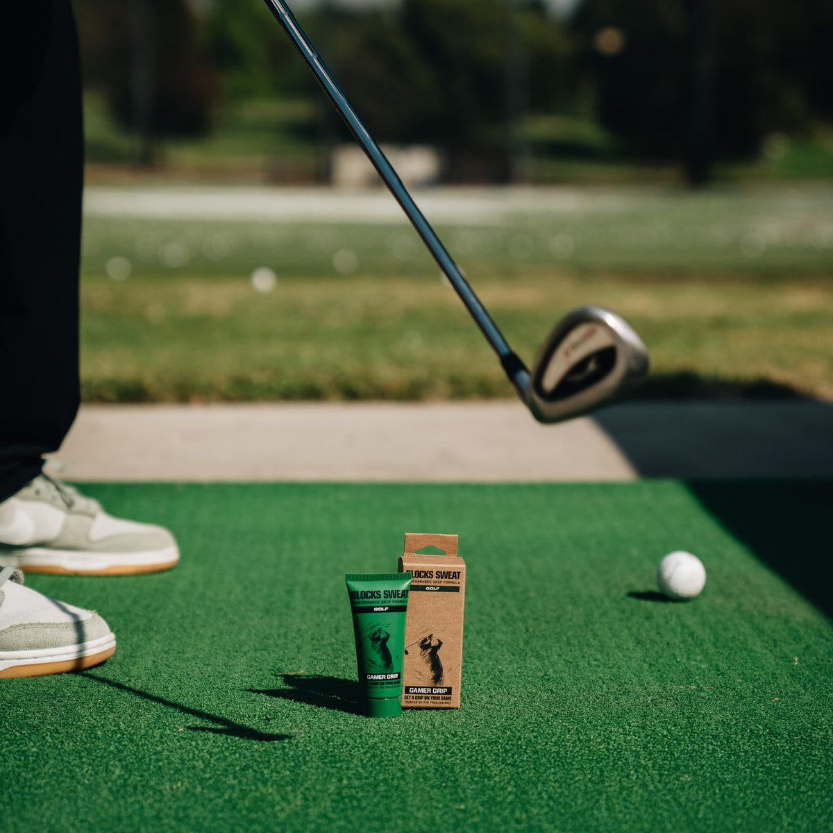 Gamer Grip used by golfer on tee demonstrating real-course performance benefit for confident swings