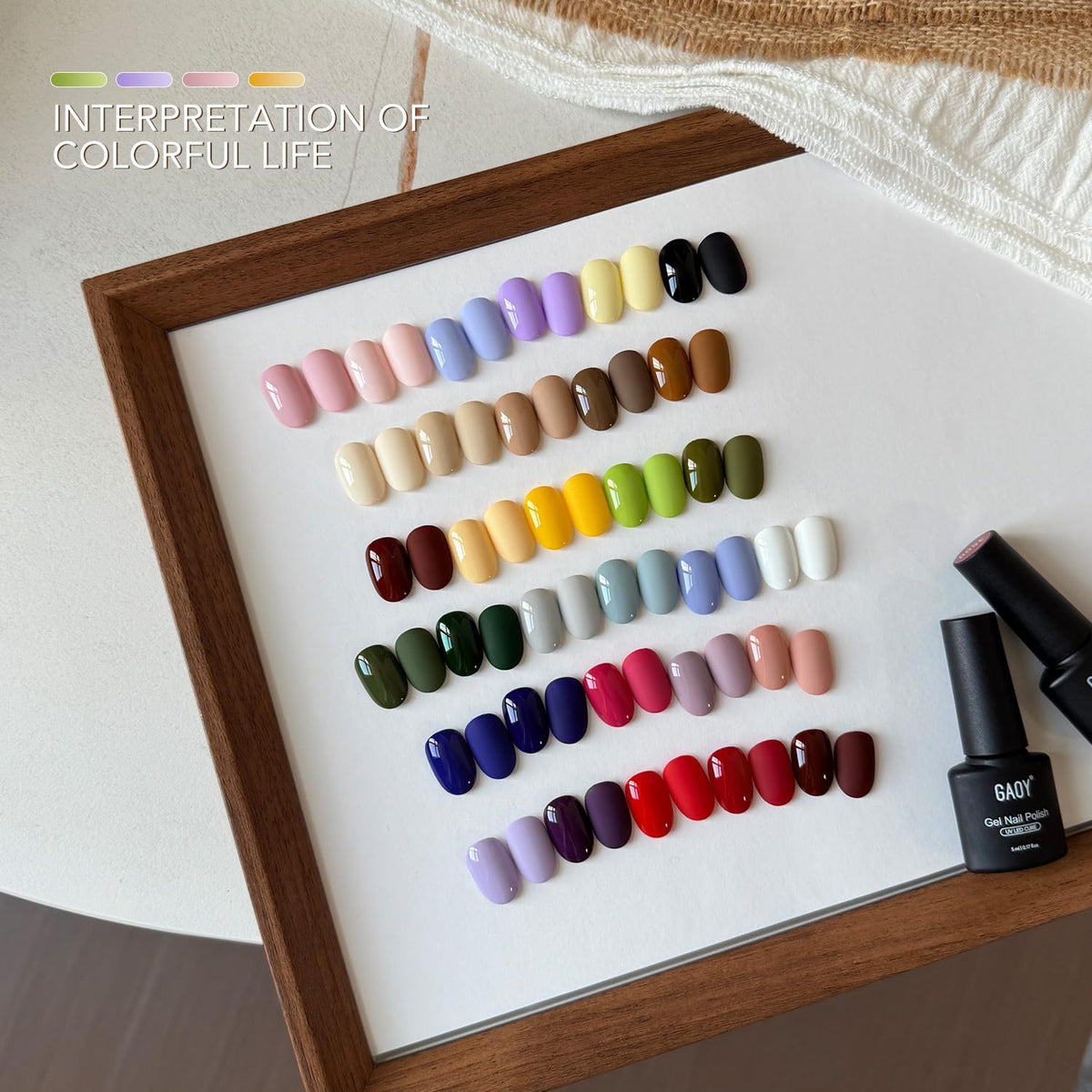 GAOY color swatches fan displaying 32 seasonal shades to inspire manicure choices