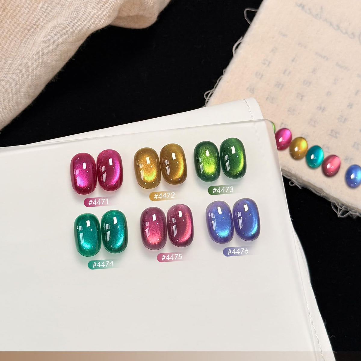 GAOY magnet held over wet gel creating cat eye stripe, precise design control benefit