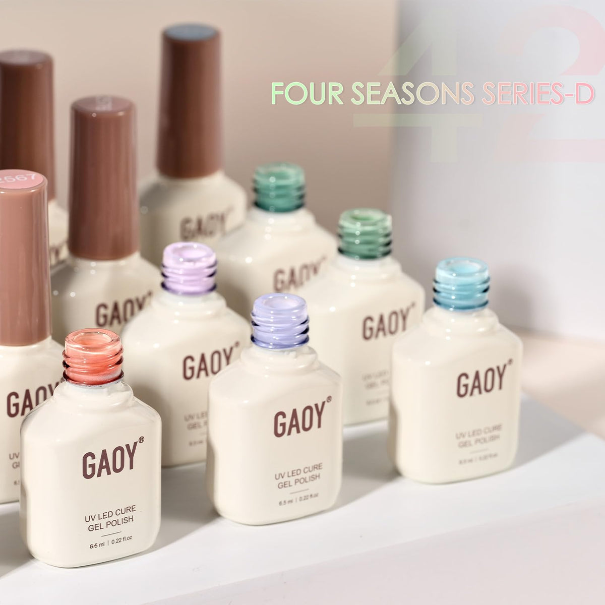 GAOY scale comparison with hand showing 6.5ml bottle size for travel-friendly convenience