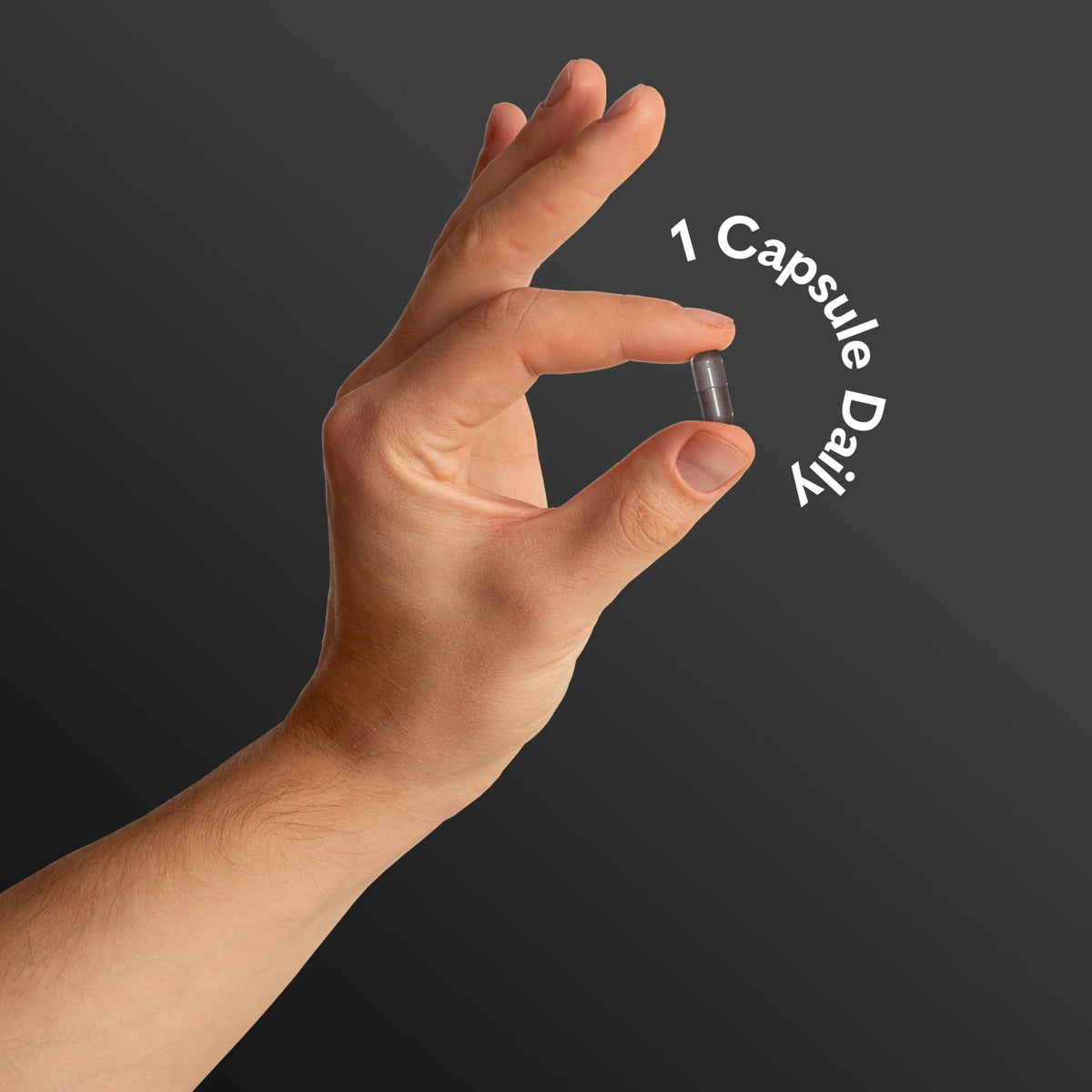 Garden of Life capsule in hand demonstrating single daily serving convenience