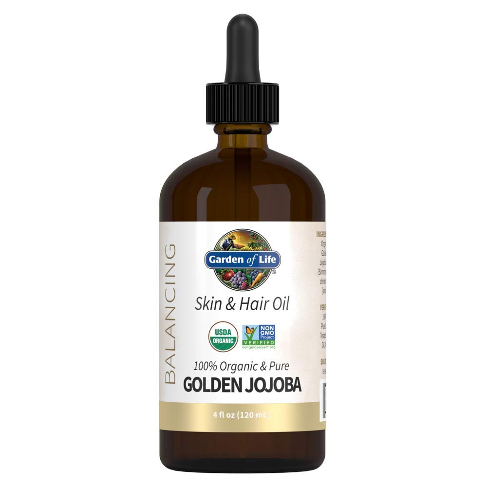Garden of Life golden jojoba oil bottle showing front label and purity benefit