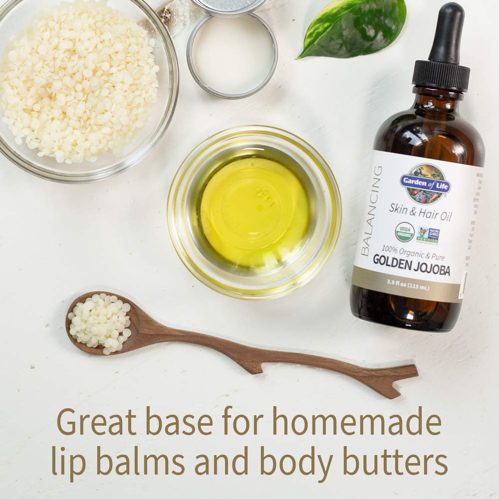 Garden of Life jojoba oil applied to hands demonstrating smooth, non-greasy finish