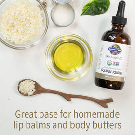 Garden of Life jojoba oil applied to hands demonstrating smooth, non-greasy finish