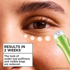 Person using Garnier eye roller in morning routine demonstrating quick application and instant cool
