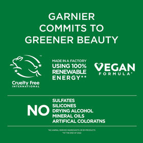 Garnier Fructis model with defined coils showing soft, bouncy results