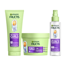 Garnier Fructis front packaging showing full three-step kit benefits