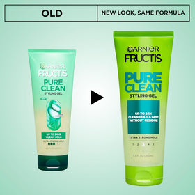 Garnier Fructis gel held in hand illustrating size and easy-dispense benefit