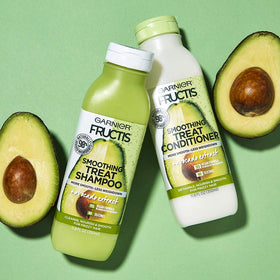 Garnier Fructis recyclable bottle symbol emphasizing eco benefit
