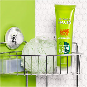 Garnier bottle in hand showing 5.1 fl oz scale for convenience
