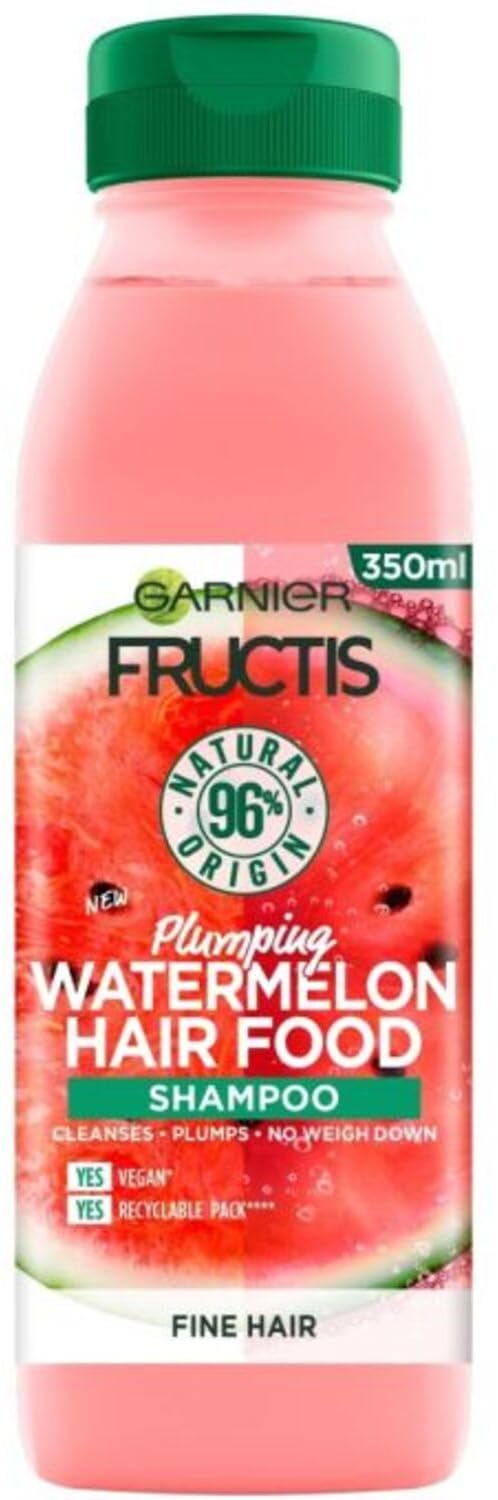 Garnier Fructis close-up of lather on hand demonstrating lightweight cleansing benefit