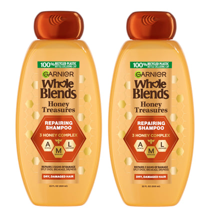 Garnier front packaging showing two 22 oz bottles with honey fragrance and benefit