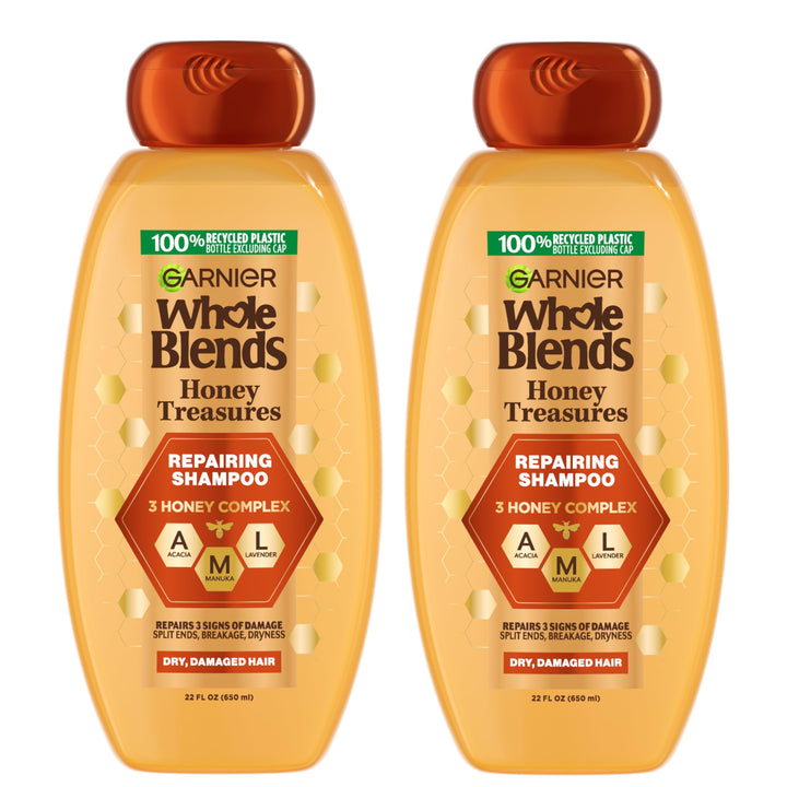 Garnier front packaging showing two 22 oz bottles with honey fragrance and benefit