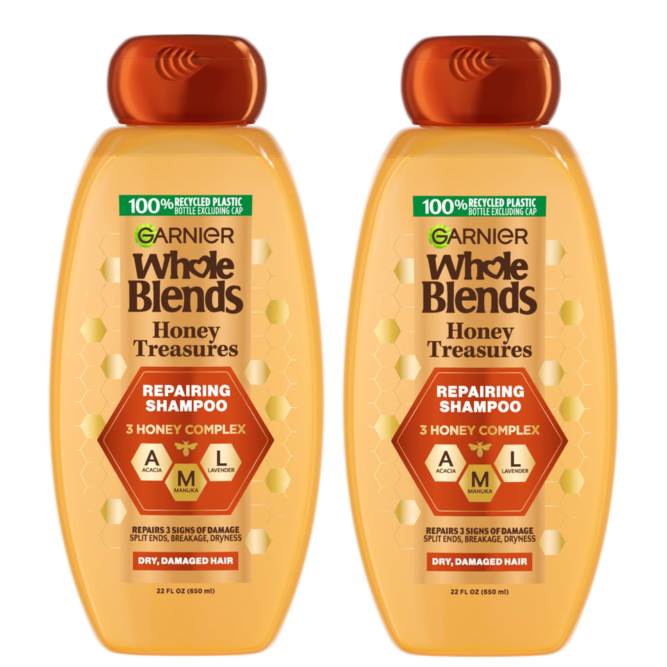 Garnier front packaging showing two 22 oz bottles with honey fragrance and benefit