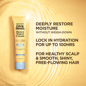 Garnier cream being applied to damp hair for instant hydration