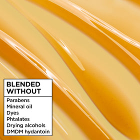 Garnier lifestyle shot with woman showing smoother, shinier hair after use benefit