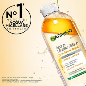 Garnier 400 ml bottle beside a standard skincare bottle showing generous size and value