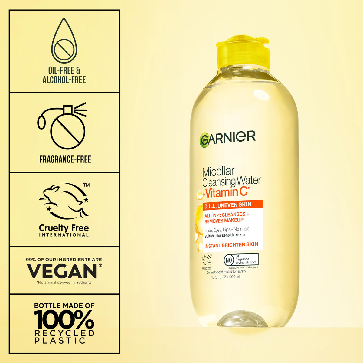 Hand holding Garnier bottle to show size and travel-friendly scale