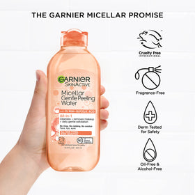 Garnier product in hand scale demonstrating bottle size convenience
