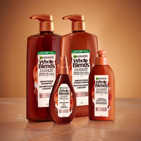 Garnier bottle held in hand to show 5.1 fl oz size and scale