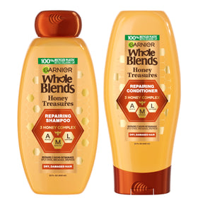 Garnier Whole Blends front packaging showing two 22 fl oz bottles and benefits