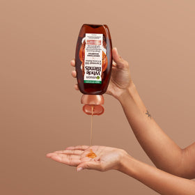 Garnier set on bathroom shelf in a styled routine promoting daily use